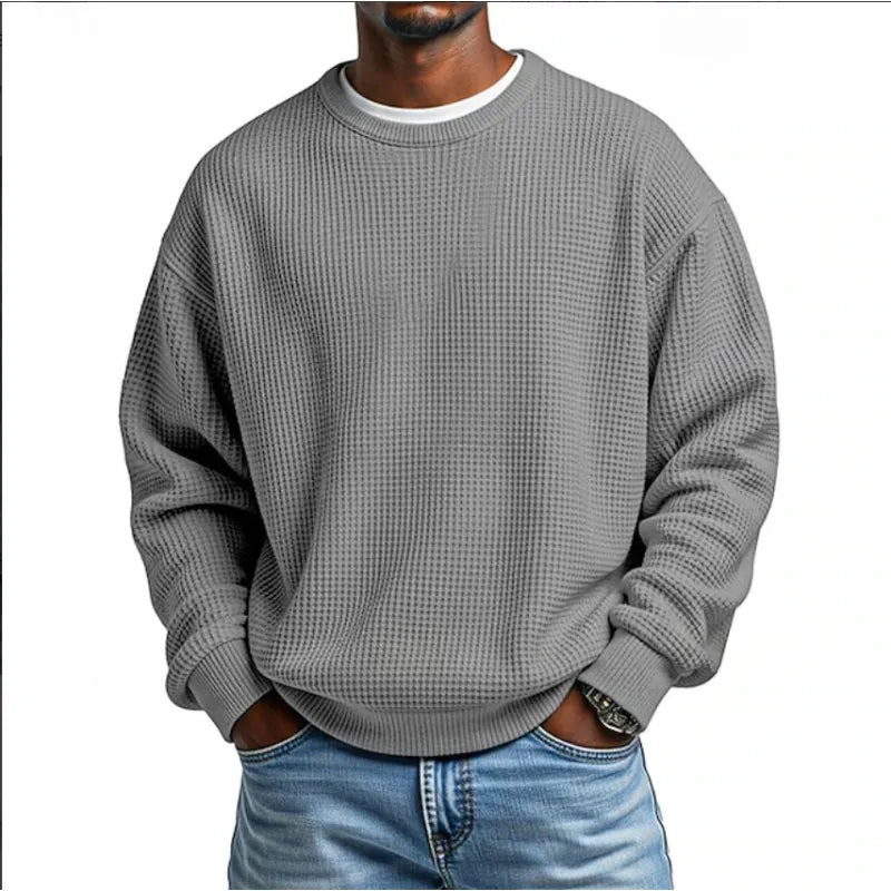 Pull sweatshirt homme noir, coupe ample. Confortable et tendance pour un look décontracté. Parfait pour l'hiver.