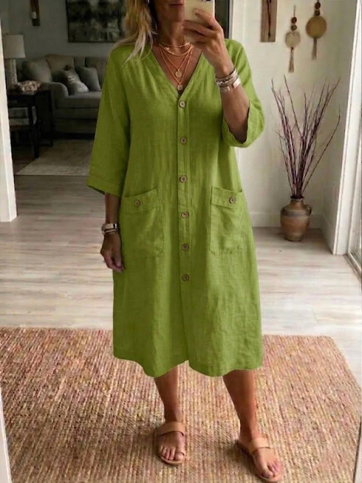 Robe midi confortable pour femme en coton et lin, col V, coupe ample, un essentiel élégant pour le printemps.