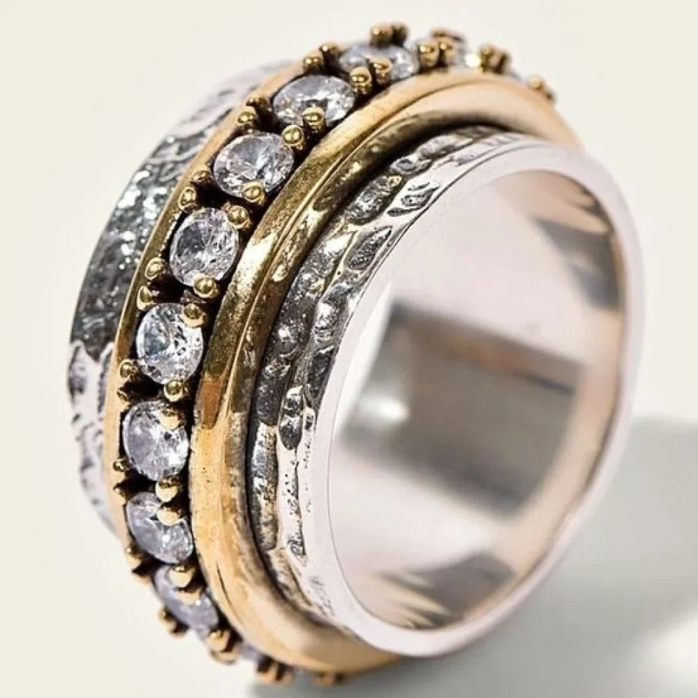Bague rétro pour femme incrustée de pierres scintillantes, un bijou élégant et intemporel.