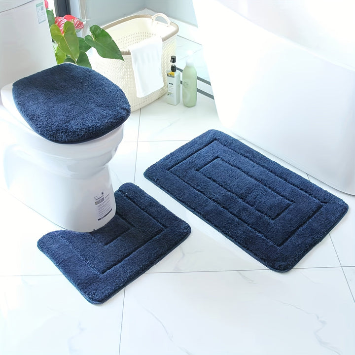 Décorez votre salle de bain avec cet ensemble de tapis moelleux et absorbants, facile d'entretien.
