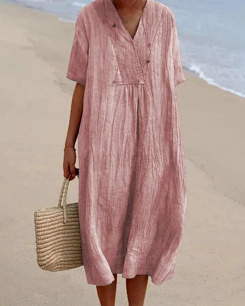 Robe d'été élégante et chic pour femme, idéale pour un look décontracté ou printanier.