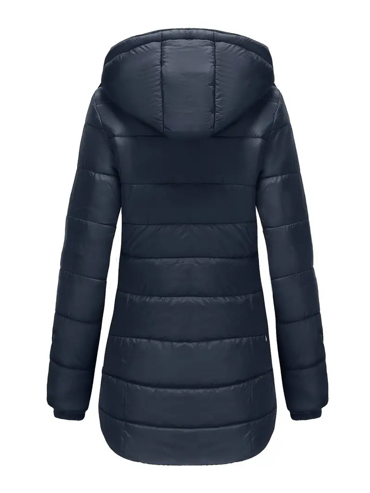 Manteau d'hiver femme élégant et urbain, mi-longue, chaud et imperméable.