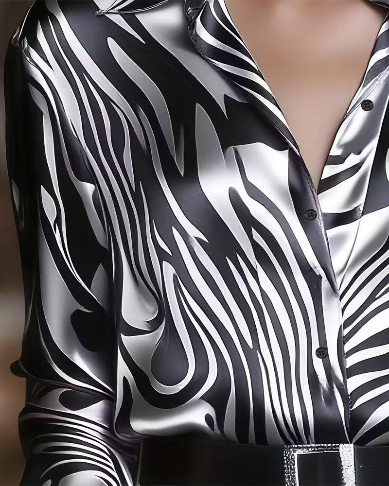 Haut femme imprimé moderne, col V. Chemise à manches longues, confortable pour un style décontracté chic.