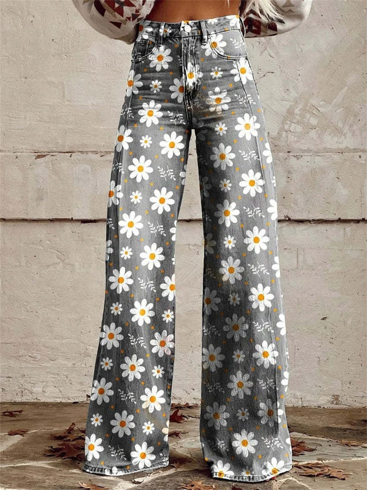 Pantalon fluide femme coupe large à motif floral tendance. Idéal pour un style d'été décontracté.
