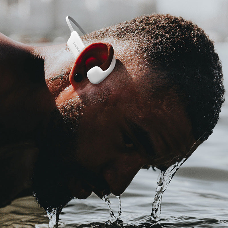 Technologie à conduction osseuse: écouteurs sans fil Bluetooth, légers, étanches IPX5. Idéal pour sport et appels.