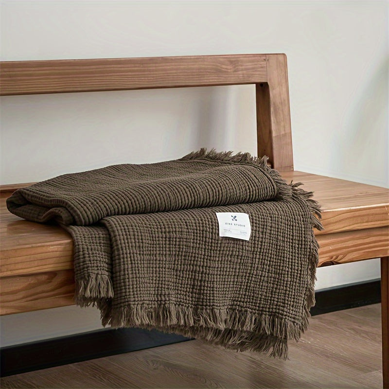 Jeté de lit respirant en gaze de coton vert olive avec franges, parfait pour la chambre.
