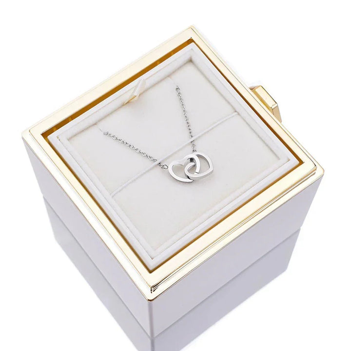 Bijoux élégants: collier femme et rose stabilisée, pour un cadeau intemporel.