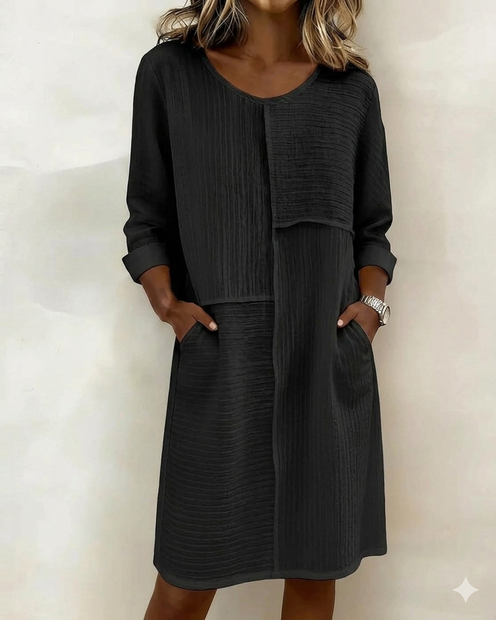 Robe fluide femme texturée en coton lin respirant. Manches 3/4, style chic décontracté, élégance au quotidien.