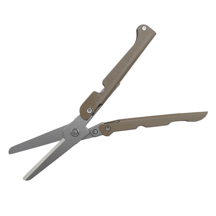 Ciseaux de précision et autres outils dans un seul accessoire de poche multifonction, idéal pour l'extérieur.