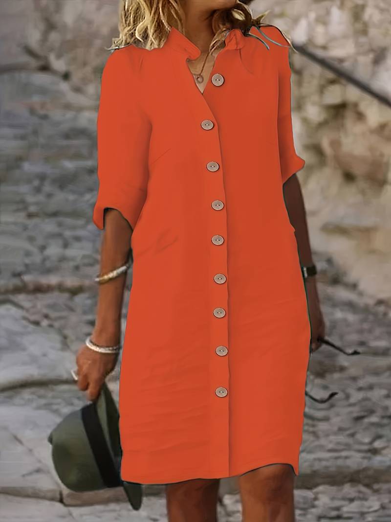 Tenue chic femme: robe midi élégante et fluide, parfaite pour le printemps-été. Style confortable et tendance.