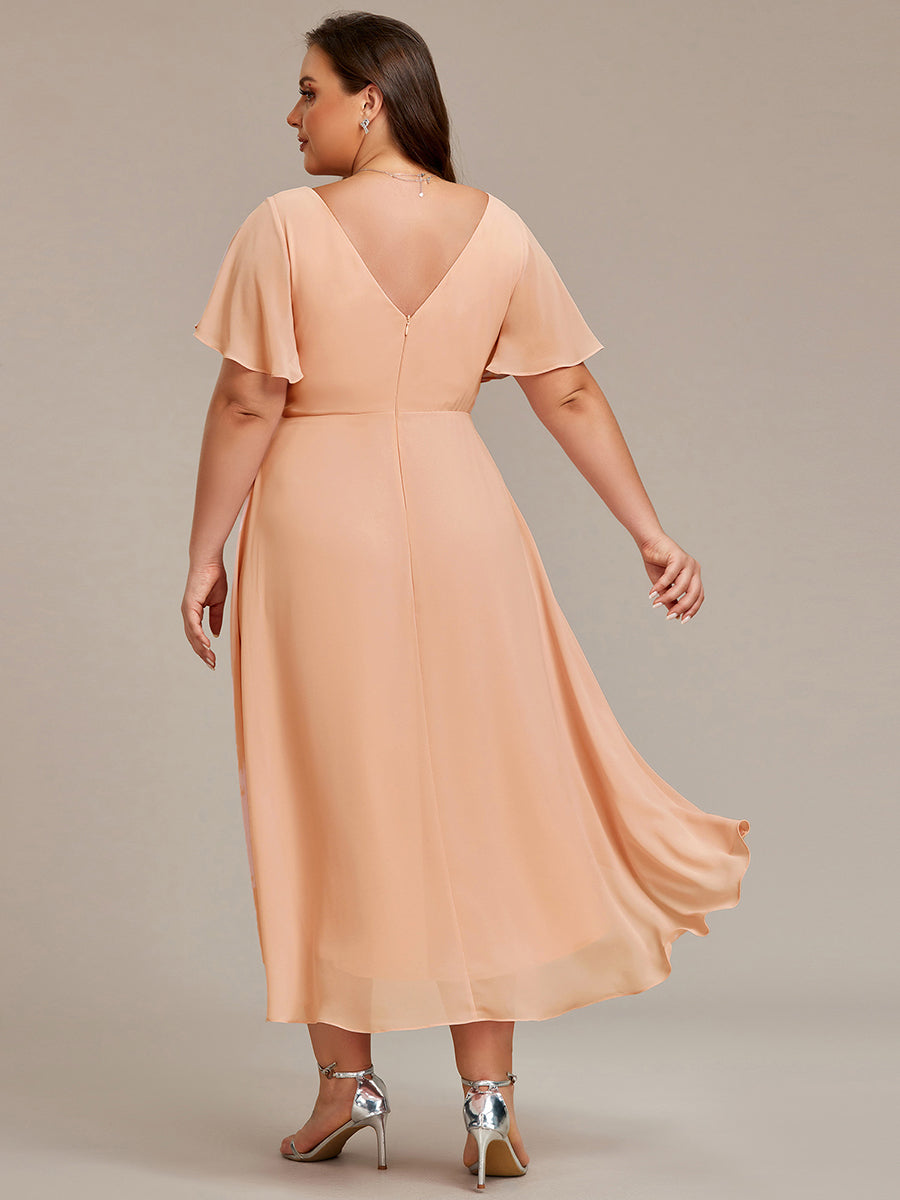 Robe femme chic col V, fluide, pour cérémonie ou soirée.