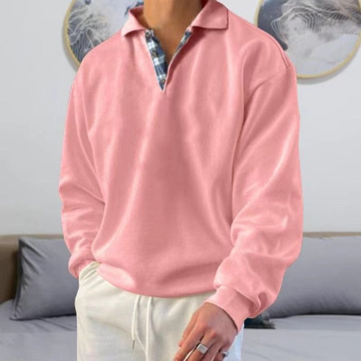 Pull homme élégant, coupe moderne, manches longues, un essentiel polyvalent de la mode masculine.