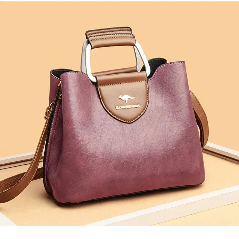 Sac à main en cuir pour femme avec bandoulière réglable, polyvalent et chic.