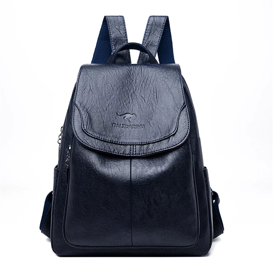 Fermeture éclair du sac à dos femme en cuir vegan. Design élégant et compartiments pratiques.