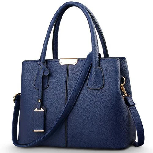 Sac femme élégant, poches spacieuses, style chic et bandoulière confortable.