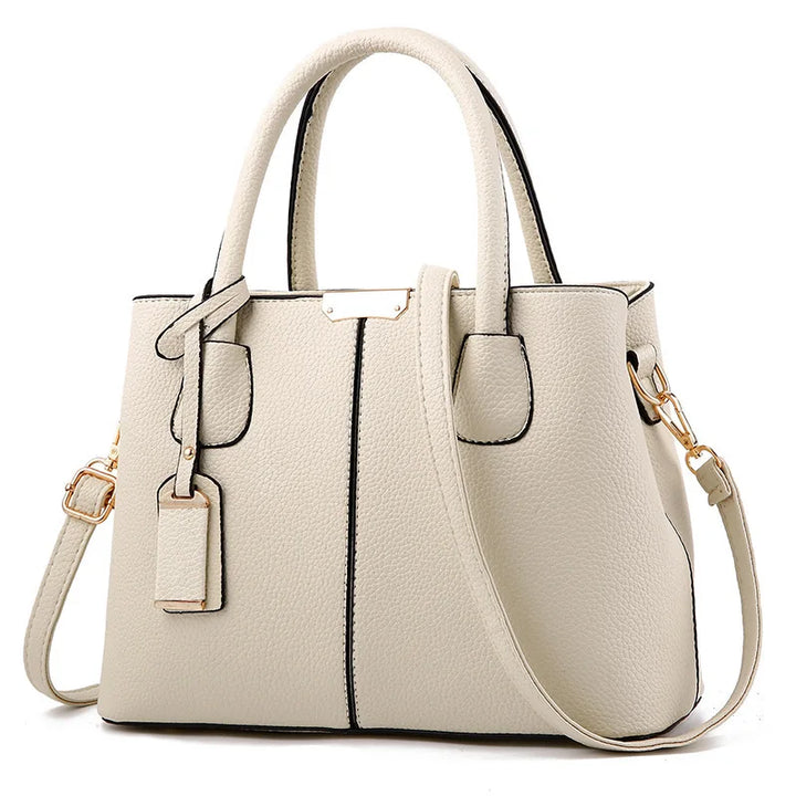 Sac à main chic pour femme, spacieux et moderne, accessoire de mode indispensable.