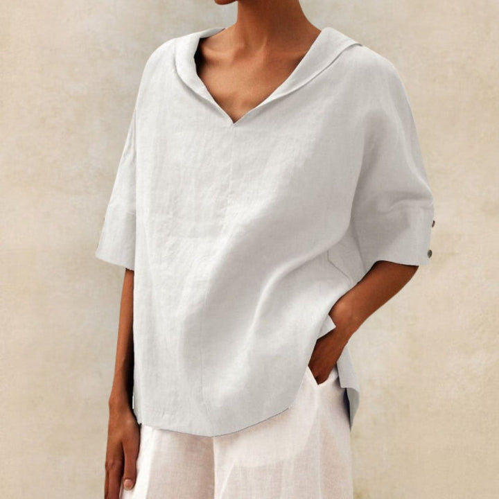 Chemise ample femme légère pour l'été, style chic et décontracté, parfaite pour la mode estivale.