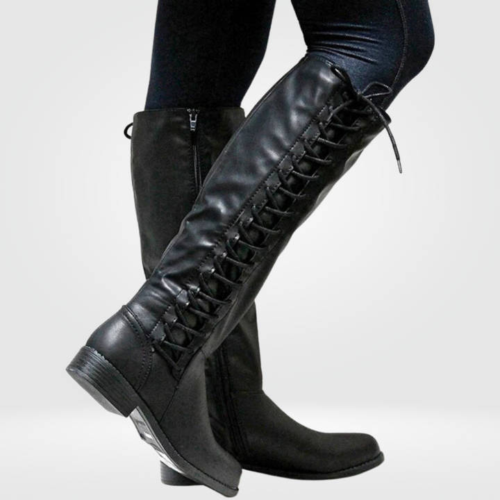 Bottes hautes femme noires élégantes. Chaudes pour l'hiver, elles offrent confort et un style sophistiqué.