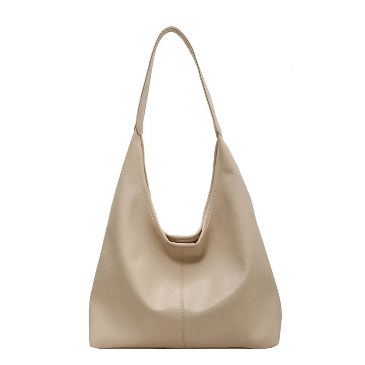 Grand sac bandoulière en cuir durable pour femme. Un accessoire de mode stylé et pratique pour toute occasion.