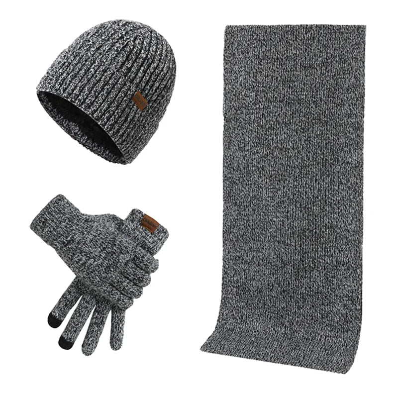 Ensemble hiver homme élégant : bonnet, écharpe et gants coordonnés pour un style chaud et protecteur.