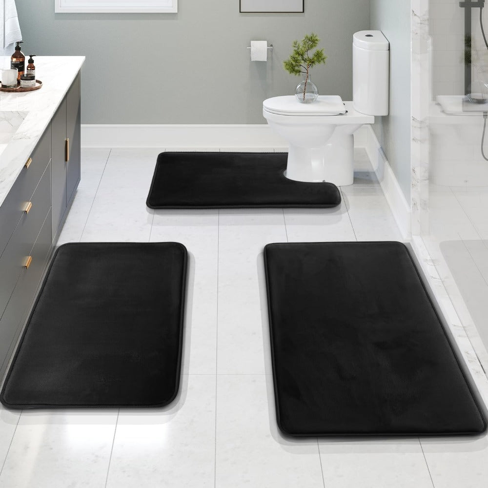 Ensemble de tapis de bain antidérapants et lavables, pour sécurité et confort dans la salle d'eau.