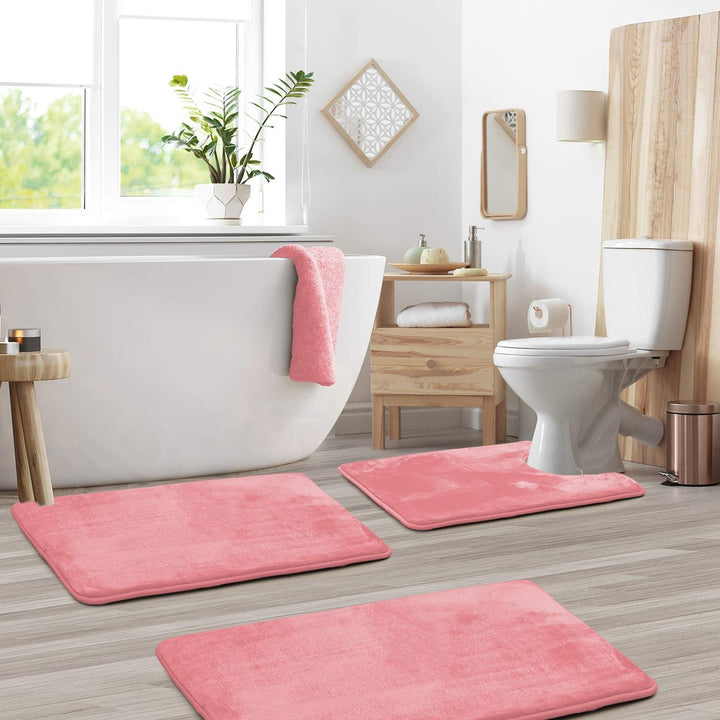 Ensemble de tapis de bain moelleux, sécurisant et absorbant, idéal pour le confort et la déco de salle de bain.