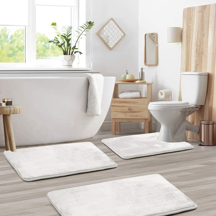 Tapis de bain antidérapant pour WC et douche, lavable. Assure confort, absorption et sécurité à la salle d'eau.