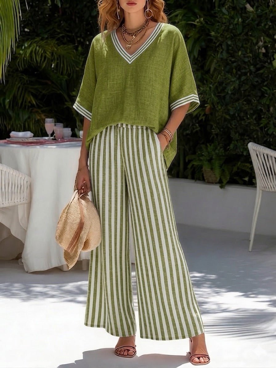 Silhouette élégante avec cet ensemble femme: pantalon large fluide et haut col V. Confort pour l'été.