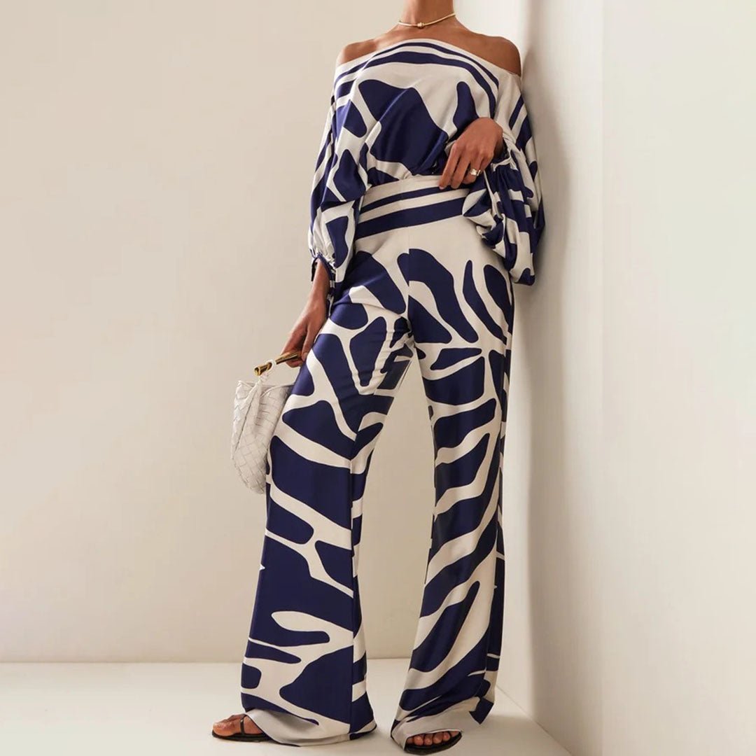 Ensemble femme moderne décontracté: haut asymétrique tendance et pantalon large confortable pour l'été.