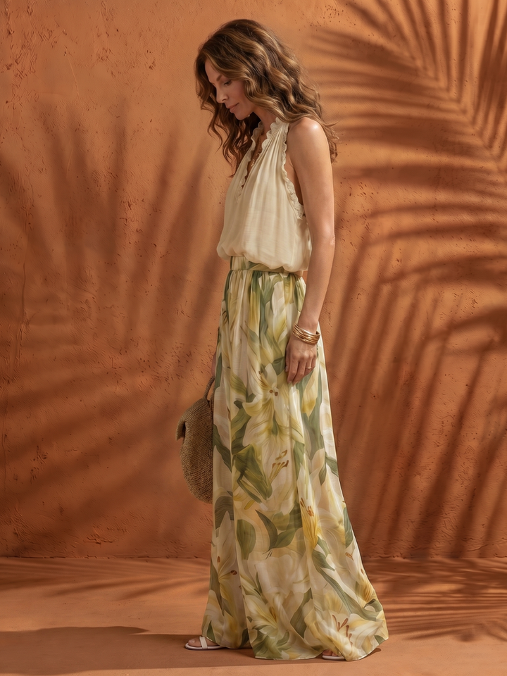 Élégant ensemble femme deux pièces : crop top dos nu et pantalon palazzo fluide imprimé floral, style bohème.