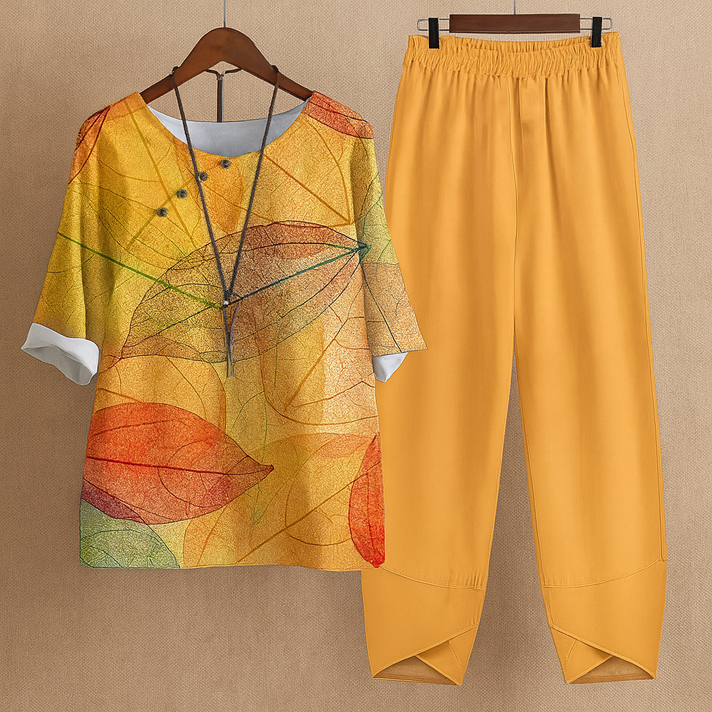 Femme en mouvement portant l'ensemble pantalon fleuri fluide, confortable et élégant pour le printemps ou l'été.