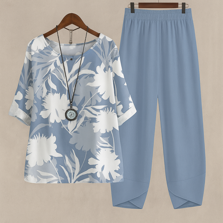 Pantalon fleuri ample et léger, assorti à son haut. Un ensemble deux pièces confortable et stylé pour femme.