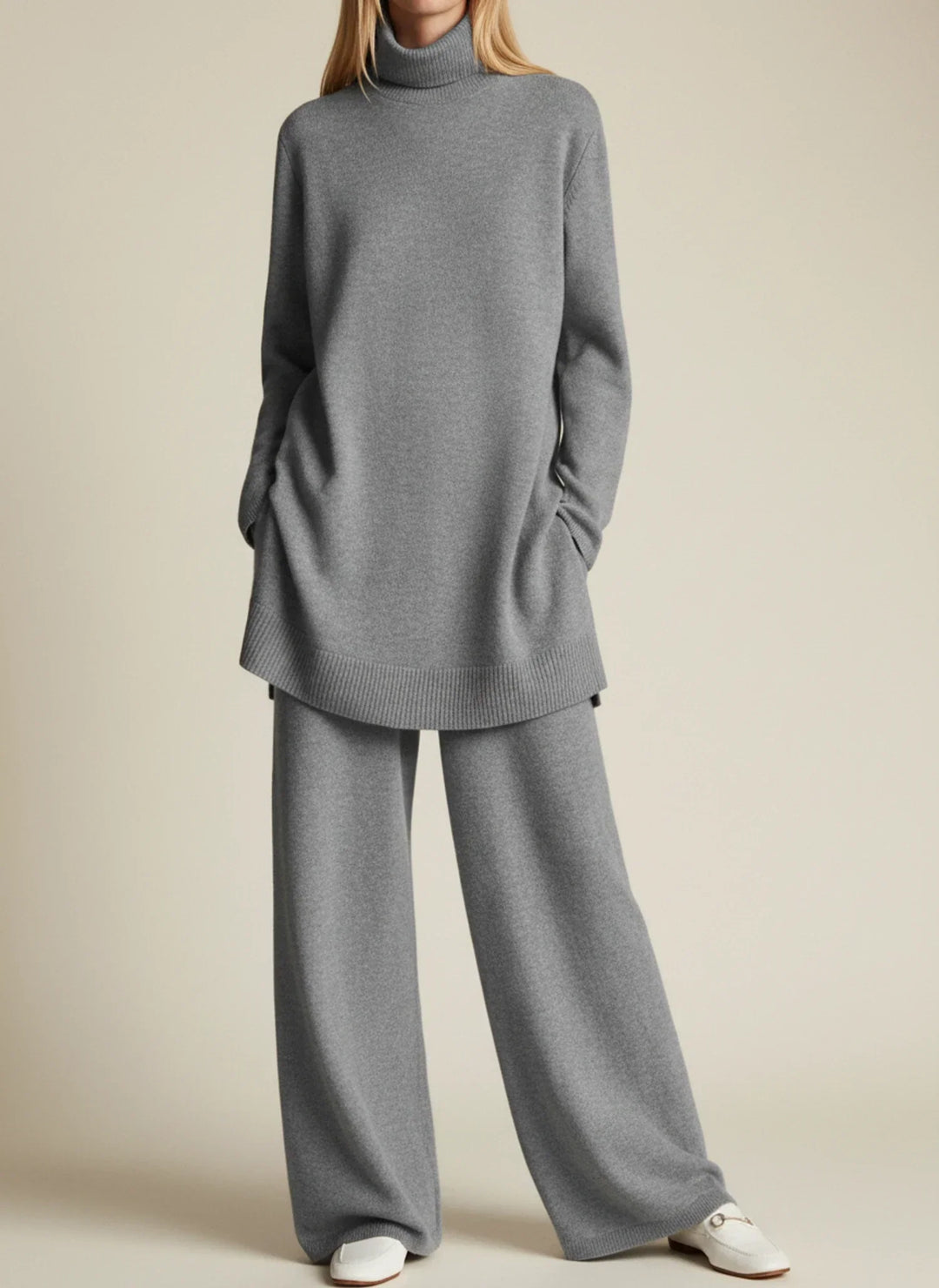 Vêtement polyvalent femme : ensemble col roulé et pantalon jambes larges. Mode féminine automne/hiver, look moderne.