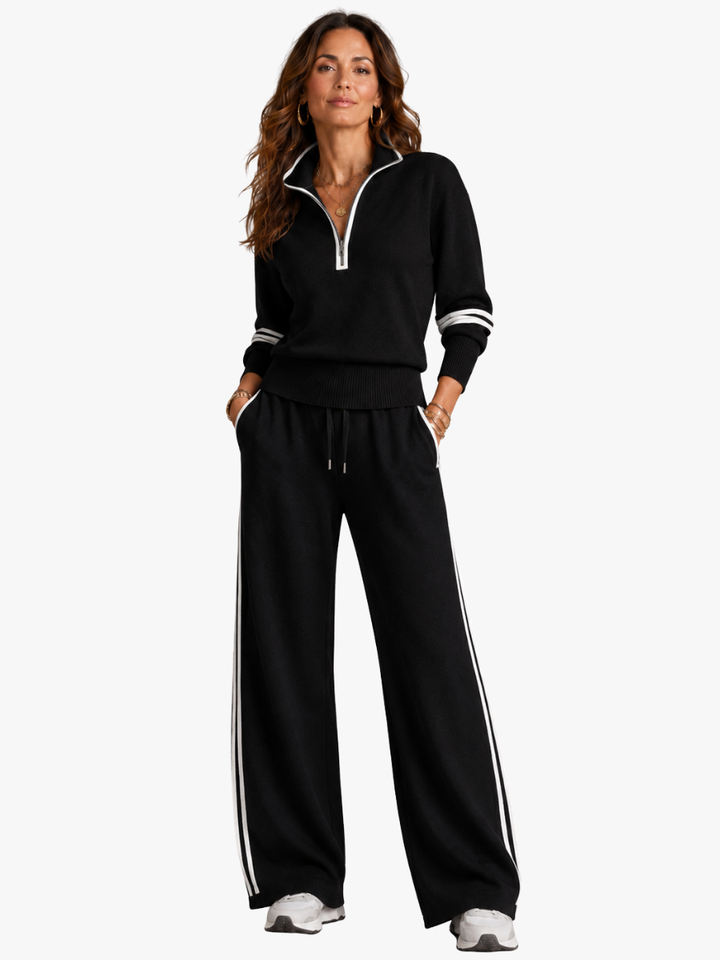 Ensemble femme rayé avec pull demi-zip col montant et pantalon large confortable. Idéal tenue décontractée sportswear.