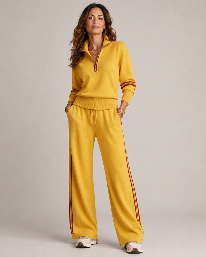 Ensemble pantalon large femme rayé, pull demi-zip col montant. Vêtement mode confortable, parfait pour le quotidien.