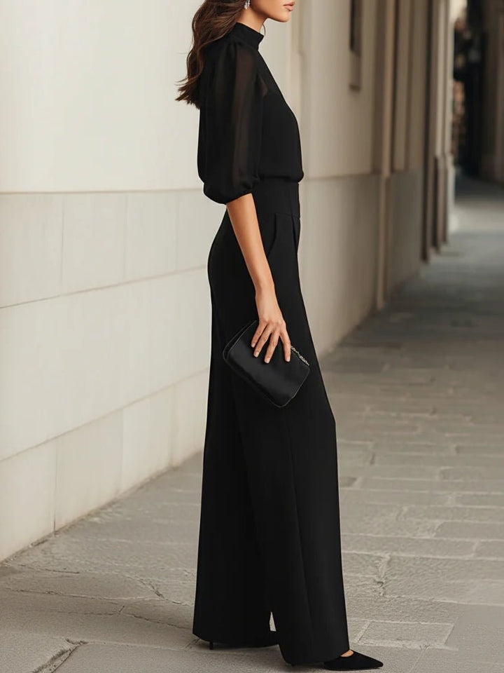 Ensemble femme noir 3 pièces: pantalon large taille haute, blouse transparente et débardeur. Tenue de soirée.