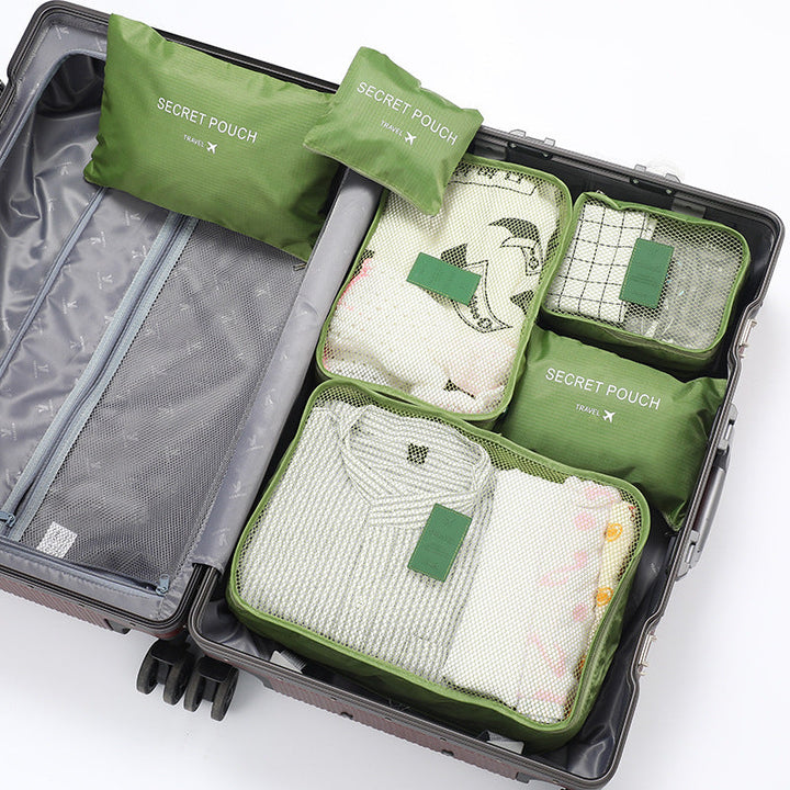 Lot de pochettes organisatrices de voyage, tailles variées. Rangement pratique pour tous vos essentiels de bagage.