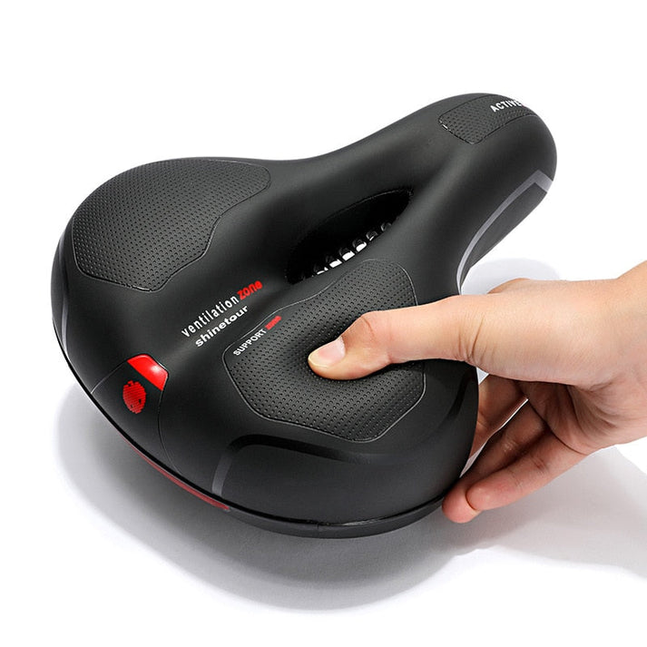 Selle vélo ergonomique noire pour hommes/femmes, confort ultime en cyclisme.