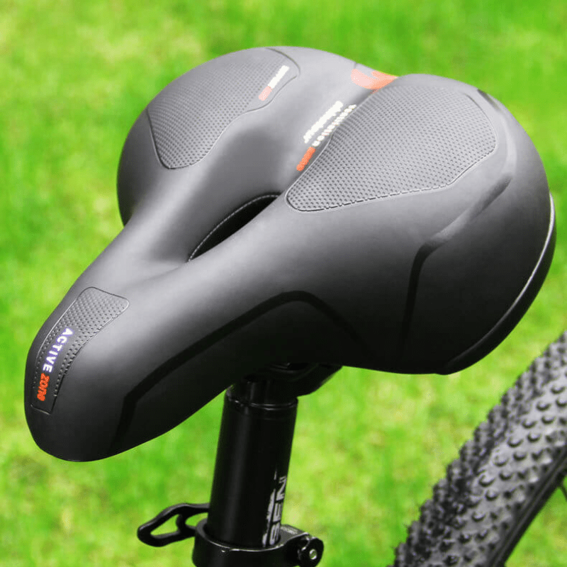 Selle de vélo SoftRide unisexe, conçue avec un design ergonomique noir pour un confort anti-douleur sur tous les trajets.