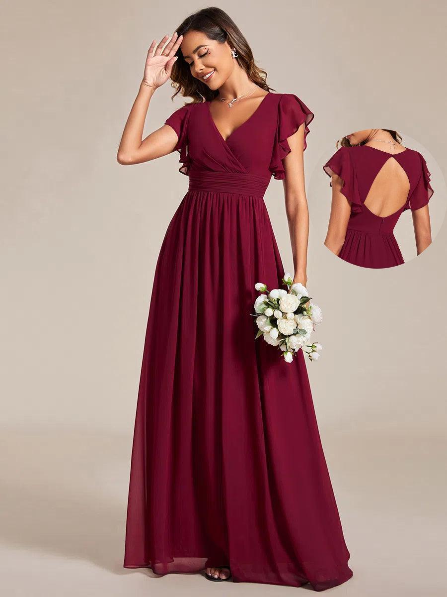 Robe longue de demoiselle d'honneur élégante, dos ouvert, pour mariage ou cérémonie printanière. Fluide et chic.
