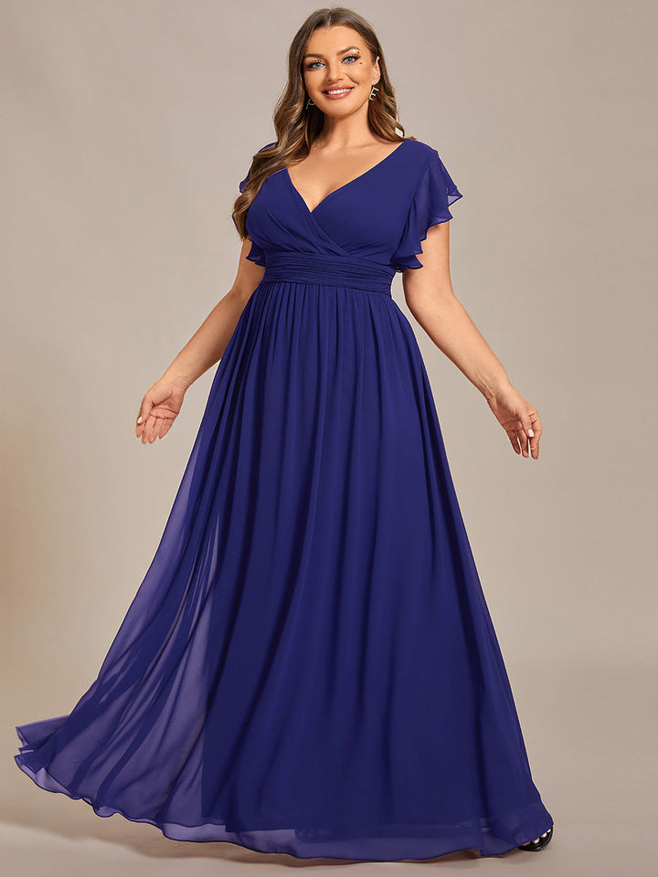 Robe fluide, dos ouvert, col en V. Élégante pour demoiselle d'honneur, longue et pour cérémonie estivale chic.