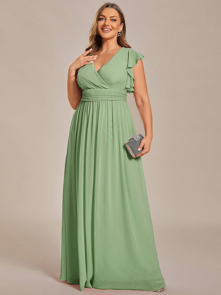Robe de cérémonie femme, dos ouvert, col en V. Longue et fluide pour un look estival parfait et tendance.