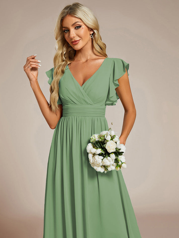 Robe de fête femme, dos ouvert, manches courtes. Fluide et maxi pour un look estival élégant et captivant.