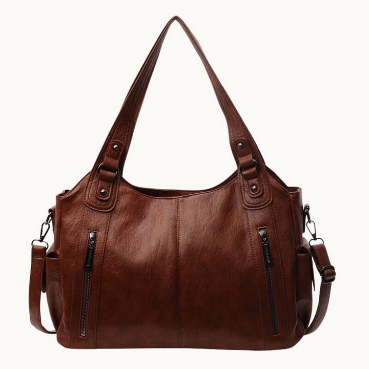 Sac à main rétro élégant, finition soignée. Accentue le look vintage chic. Idéal comme accessoire mode.