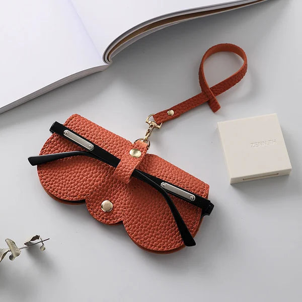 Accessoire en cuir PU souple et élégant pour lunettes de soleil, anti-rayures et chic.