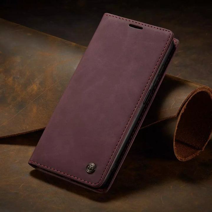 Housse de protection pour téléphone en cuir synthétique coloris variés, fonction portefeuille intégrée.