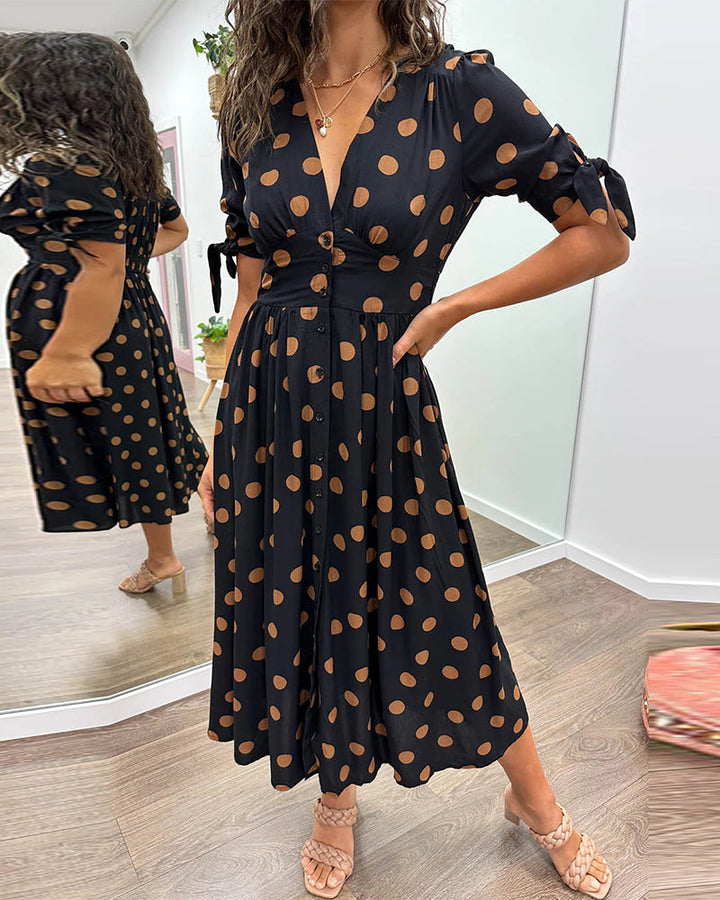 Robe midi fluide élégante pour femme, idéale printemps/été, style chic et confortable.