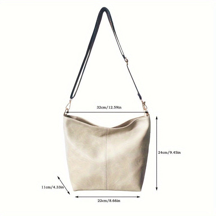 Sac bandoulière chic femme, motif géométrique unique, grande capacité, parfait pour le quotidien.