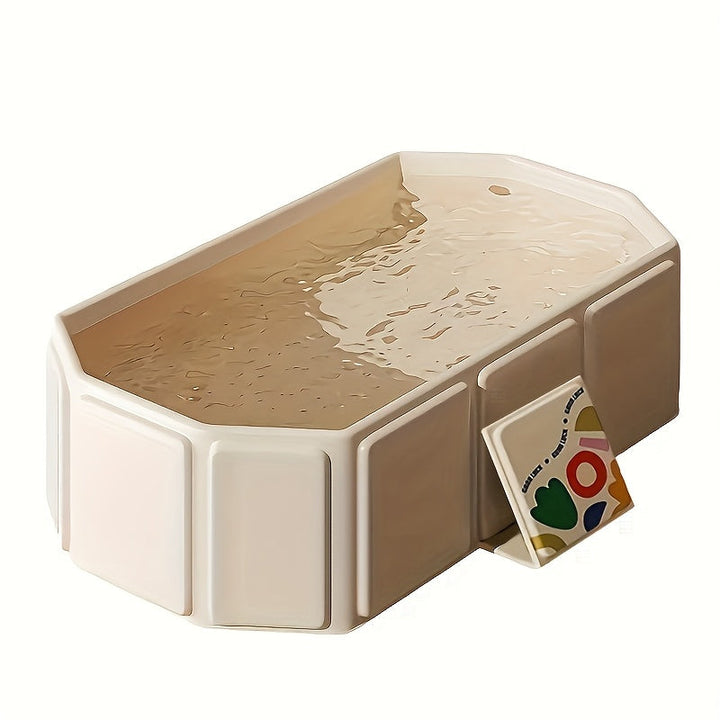 Baignoire bébé pliable, spacieuse et confortable, blanche et verte, idéale pour le bain des nourrissons.