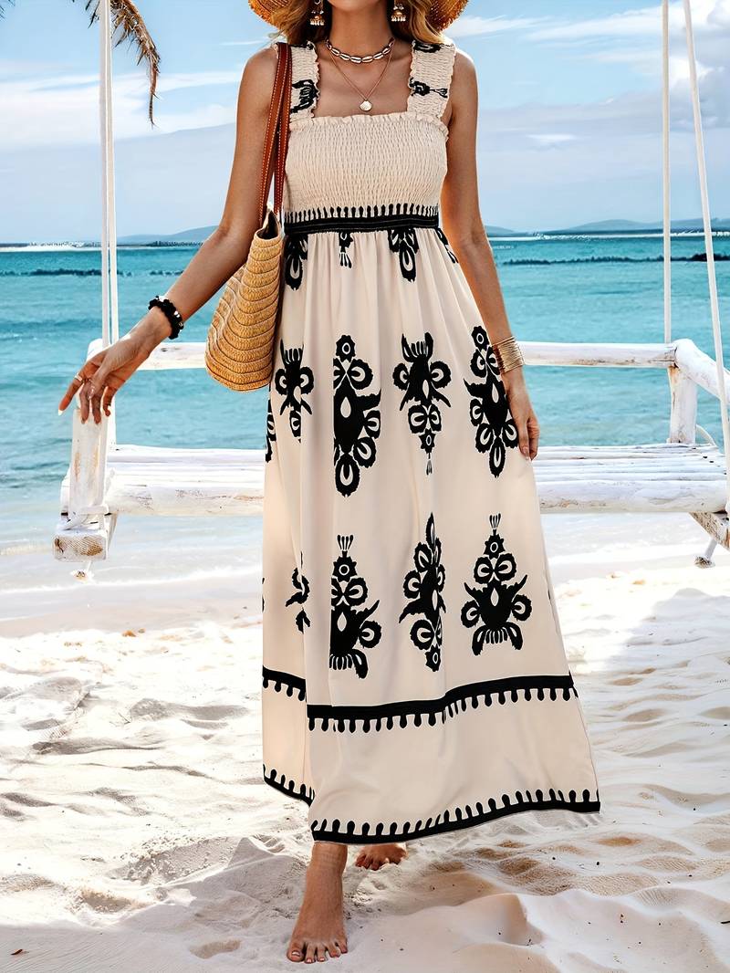 Robe longue femme style bohème maxi, confortable et fluide, avec motifs pour un été décontracté et stylé.